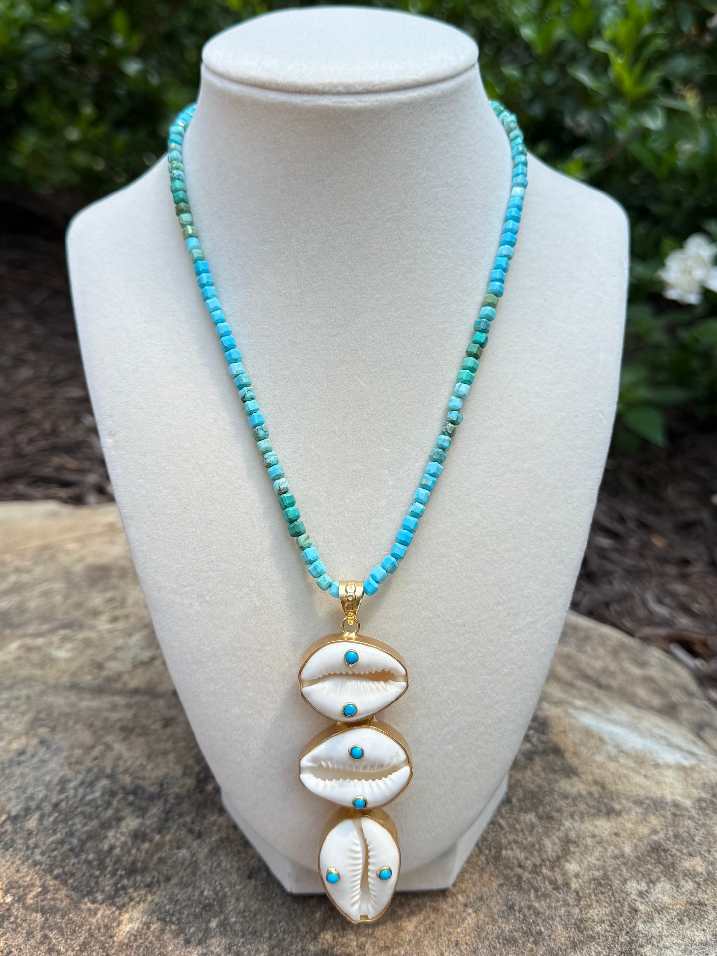 turquoise with cowrie shell with turquoise accents