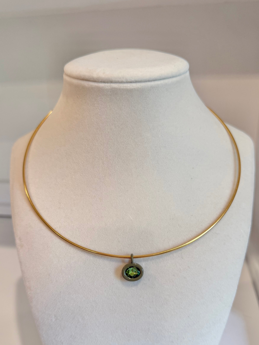 gold collar with olive green charm
