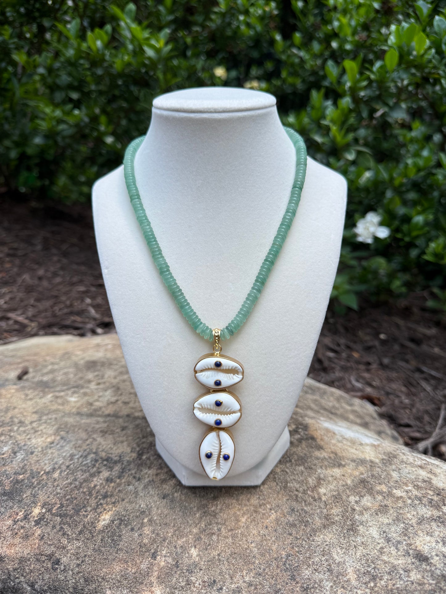 green aventurine with cowrie shell and lapis accents