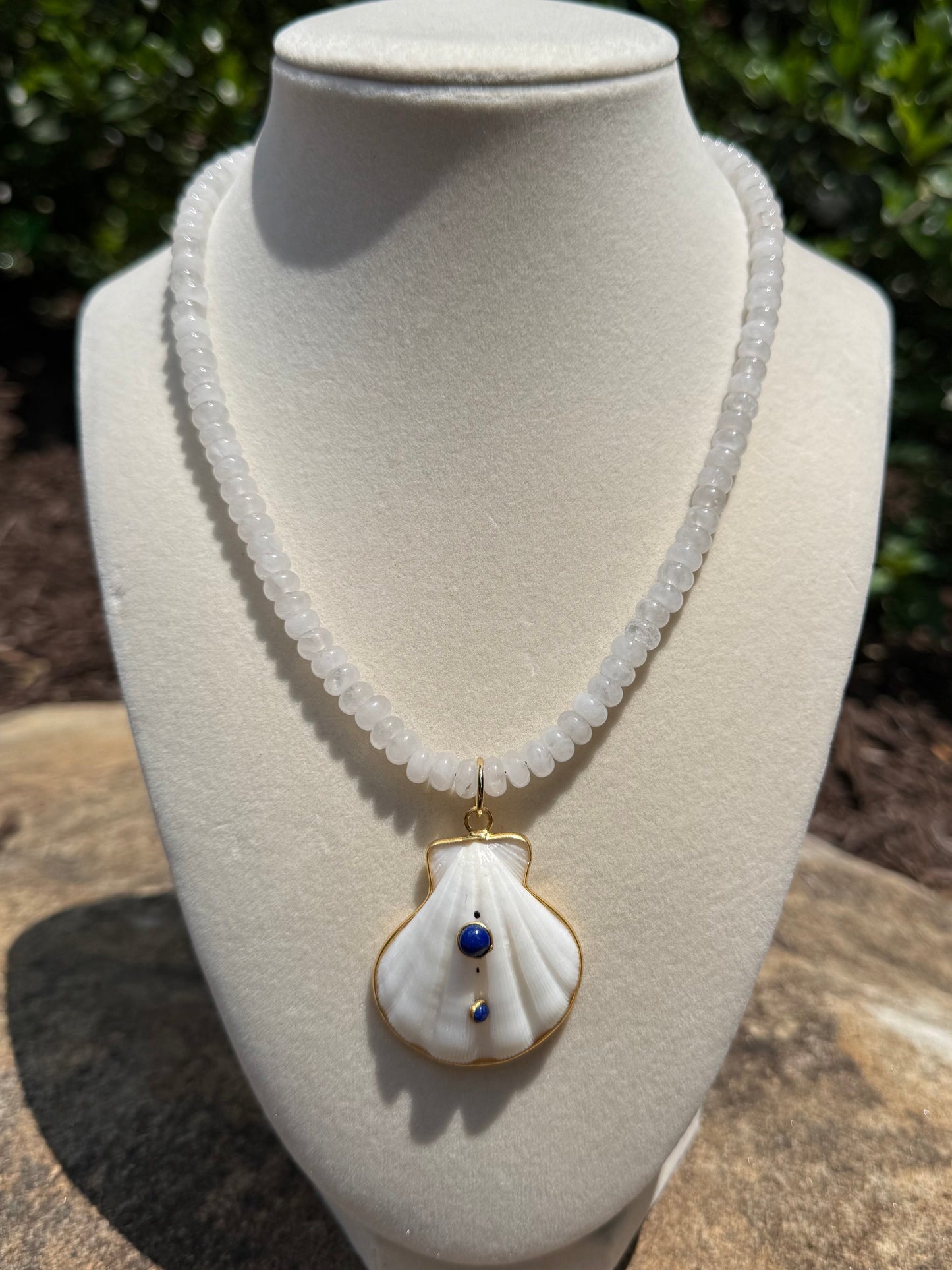 white with white shell and lapis accents