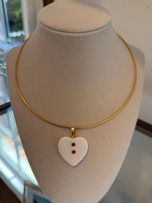 carnelian resin charm on gold collar